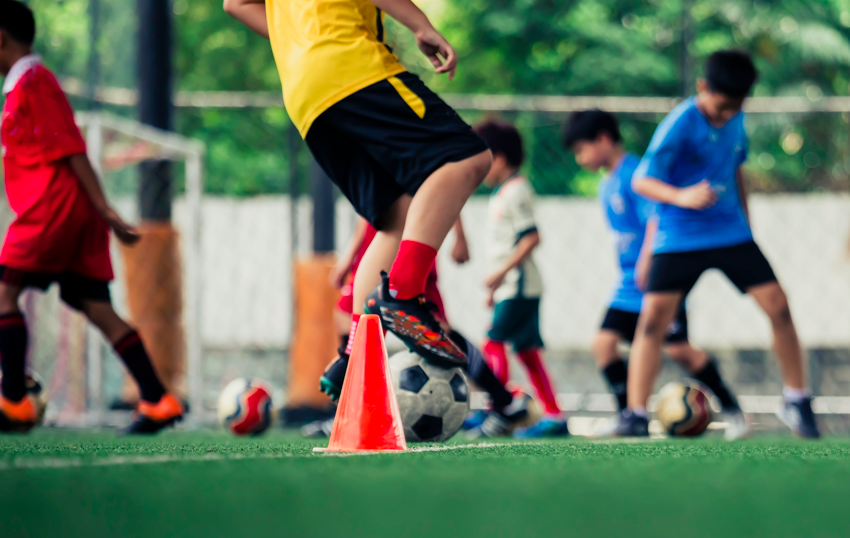Kids doing soccer activities